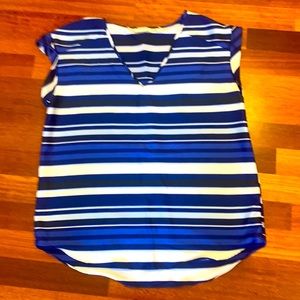 New York and Company Navy and royal blue striped capped sleeve blouse.